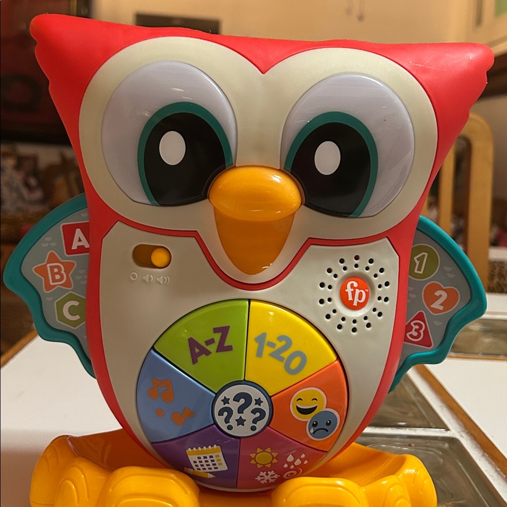Fisher-Price owl learning toyInteractive bright colors —lights up.
